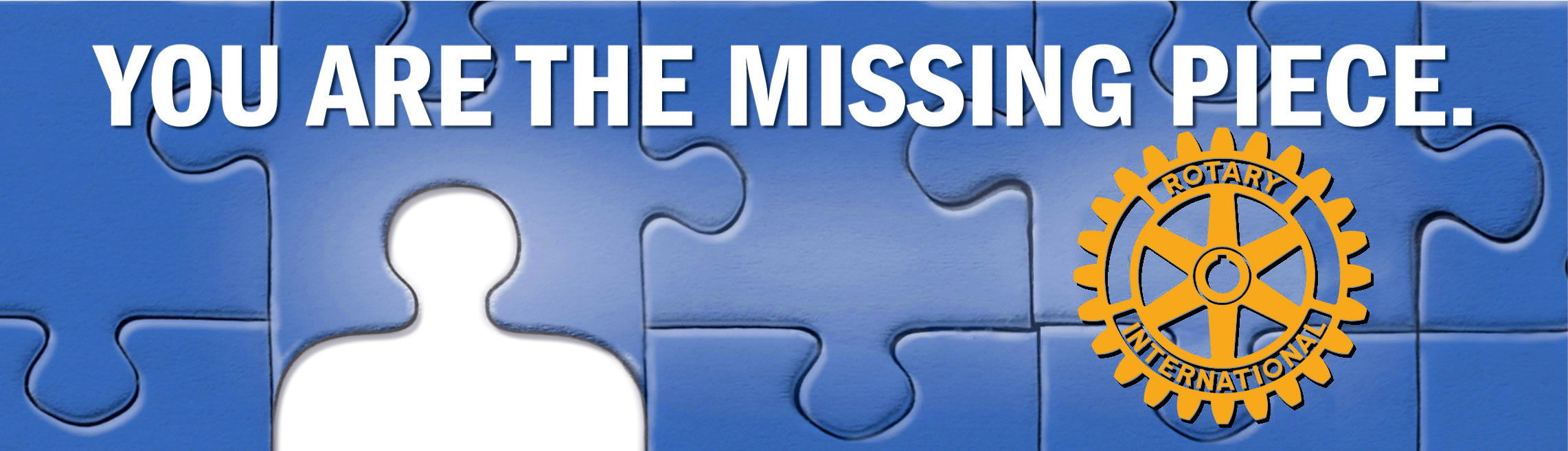Puzzle pieces with Rotary logo and statement "You Are The Missing Piece".